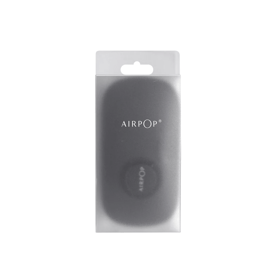 A black and white photo of an AirPop Pocket Storage Case.